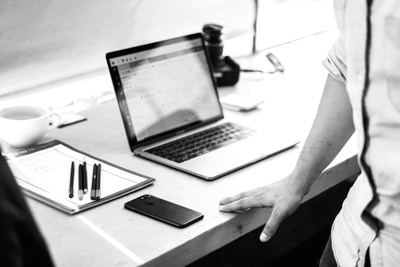Financial analysis workspace with charts and documents