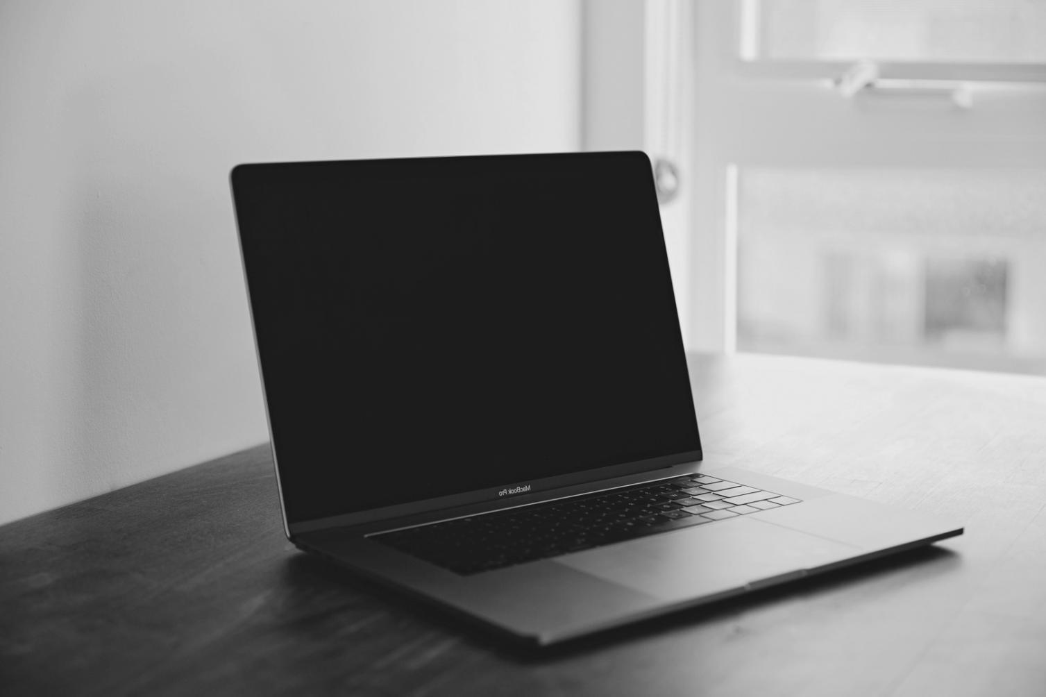Calculator and financial statements with highlighted key metrics
